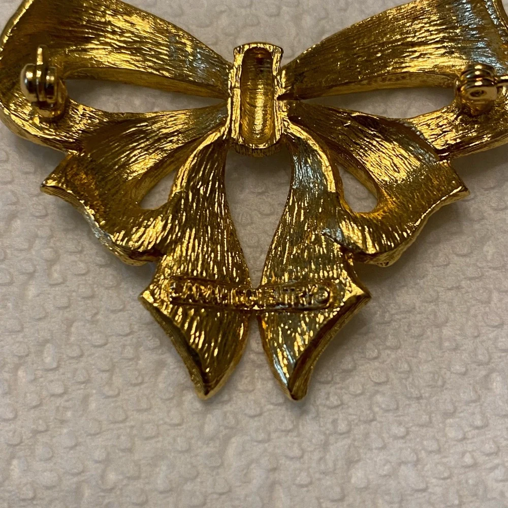 Vintage Sarah Coventry Gold Tone Bow Brooch Shimmery Signed